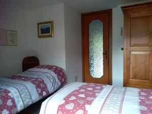 Postel nebo postele na pokoji v ubytování Sunlake lago
