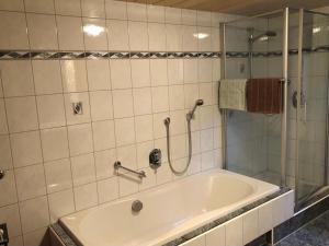 Ванна кімната в Haus Konzett
