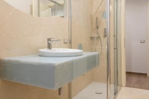 Ένα μπάνιο στο Residenza Felix by Mmega