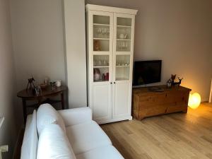 Telewizja i/lub zestaw kina domowego w obiekcie Appartamento Isa