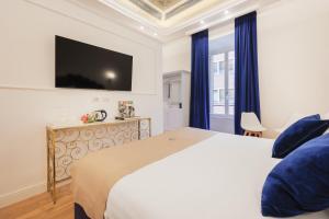 Postel nebo postele na pokoji v ubytování SM Mellini Relais B&B
