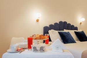 Postel nebo postele na pokoji v ubytování SM Mellini Relais B&B