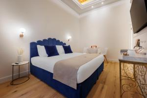 Postel nebo postele na pokoji v ubytování SM Mellini Relais B&B