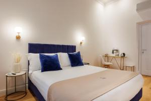 Postel nebo postele na pokoji v ubytování SM Mellini Relais B&B