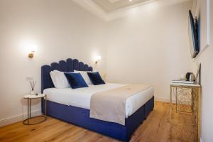 Postel nebo postele na pokoji v ubytování SM Mellini Relais B&B