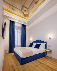 Postel nebo postele na pokoji v ubytování SM Mellini Relais B&B
