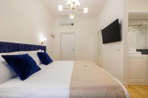 Postel nebo postele na pokoji v ubytování SM Mellini Relais B&B