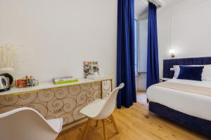 Postel nebo postele na pokoji v ubytování SM Mellini Relais B&B