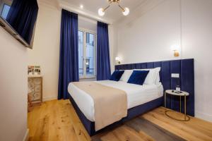 Postel nebo postele na pokoji v ubytování SM Mellini Relais B&B
