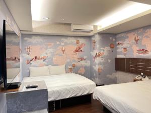 Katil atau katil-katil dalam bilik di Jung Shin Hotel