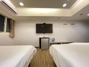 Televisyen dan/atau pusat hiburan di Jung Shin Hotel
