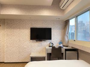 Televisyen dan/atau pusat hiburan di Jung Shin Hotel