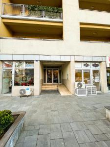 a store front of a building with windows at Condo 21 in Belgrade