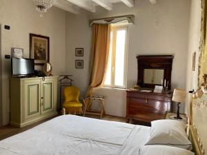 Postel nebo postele na pokoji v ubytování B&B Corte Seguini