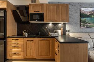 Kuchyňa alebo kuchynka v ubytovaní ZAKOHOME- Apartamenty Sabały