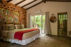 Katil atau katil-katil dalam bilik di Hotel Boutique Ananas
