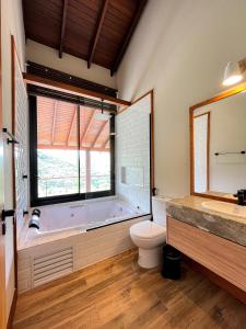 Ein Badezimmer in der Unterkunft MORADA DOS IPÊS