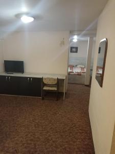 TV a/nebo společenská místnost v ubytování Petar Guest House