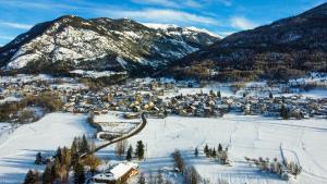 an aerial view of a small town in the snow at BRIANCON - SERRE CHEVALIER 1200 - Joli Appartement - Face aux Pistes en Centre Ville in Briançon