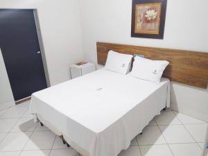 Postel nebo postele na pokoji v ubytování Hotel Master