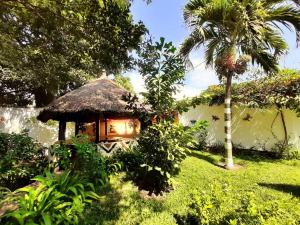 Сад в Casa Hotel Sinkiling Gambia