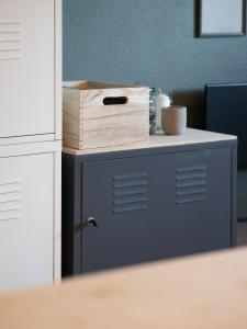 a counter with a wooden box on top of it at Sentrumsvegen - Private Studio Apartment in Gol in Gol