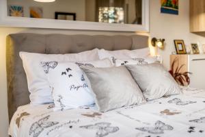 Posteľ alebo postele v izbe v ubytovaní Apartments Stella Mariela