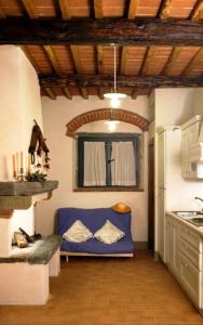 Postel nebo postele na pokoji v ubytování Agriturismo Podere Luisa