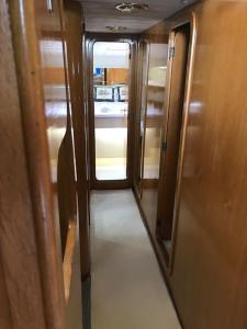 an open door to a hallway on a train at Motor yacht 45' in Aegina Town