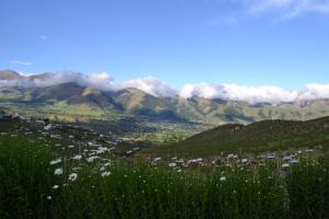 a view of a valley with mountains in the background at Aires del Alto - casas in Tafí del Valle