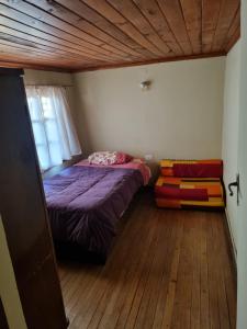 Postel nebo postele na pokoji v ubytování Casa Lidia