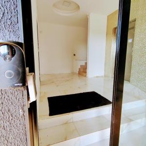 a door to a room with a mirror at Pousada Sol in Pato Branco