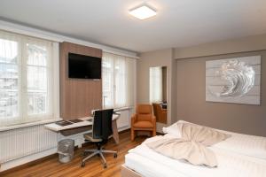 TV a/nebo společenská místnost v ubytování Hotel Post