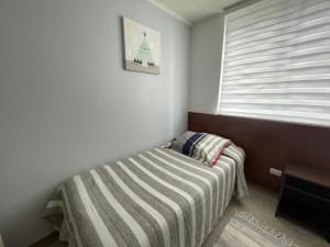 Cama o camas de una habitación en Departamento Full La Serena