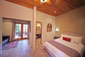 Postel nebo postele na pokoji v ubytování Los Establos Boutique Resort - All Inclusive + 37 fotografií