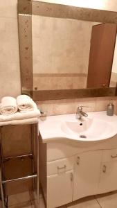 Koupelna v ubytování Nova DOM + 16 fotografií