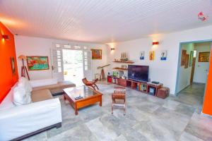 TV a/nebo společenská místnost v ubytování AGREABLE VILLA DU DIAMANT