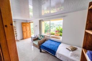 Cama o camas de una habitación en Tambo Eco Hotel