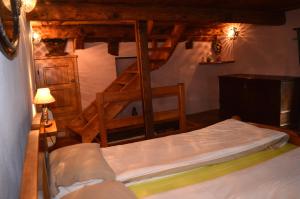 A bed or beds in a room at Casa della Nonna