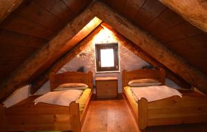 A bed or beds in a room at Casa della Nonna