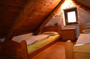 A bed or beds in a room at Casa della Nonna