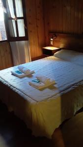 Posteľ alebo postele v izbe v ubytovaní Cabañas Teushen
