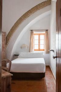 Postel nebo postele na pokoji v ubytování Hotel Tugasa Convento San Francisco