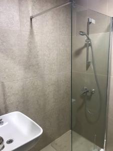 Koupelna v ubytování Hotel David Zhorzholiani