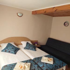 Postel nebo postele na pokoji v ubytování Guest House Planinski Zdravets