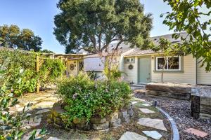 a house with a tree in the yard at Cozy Arroyo Grande Cottage with Patio and Grill! in Arroyo Grande