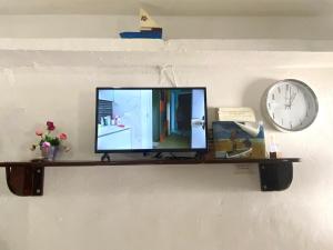 Televízia a/alebo spoločenská miestnosť v ubytovaní Posada Xtakay Bacalar ''Turix''