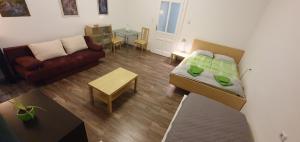 A bed or beds in a room at Appartement Belvedere Wien
