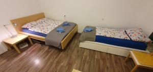 A bed or beds in a room at Appartement Belvedere Wien