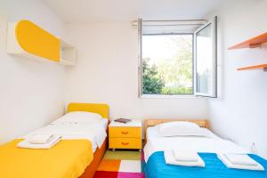 Postel nebo postele na pokoji v ubytování SPACIOUS TWO BEDROOM APARTMENT